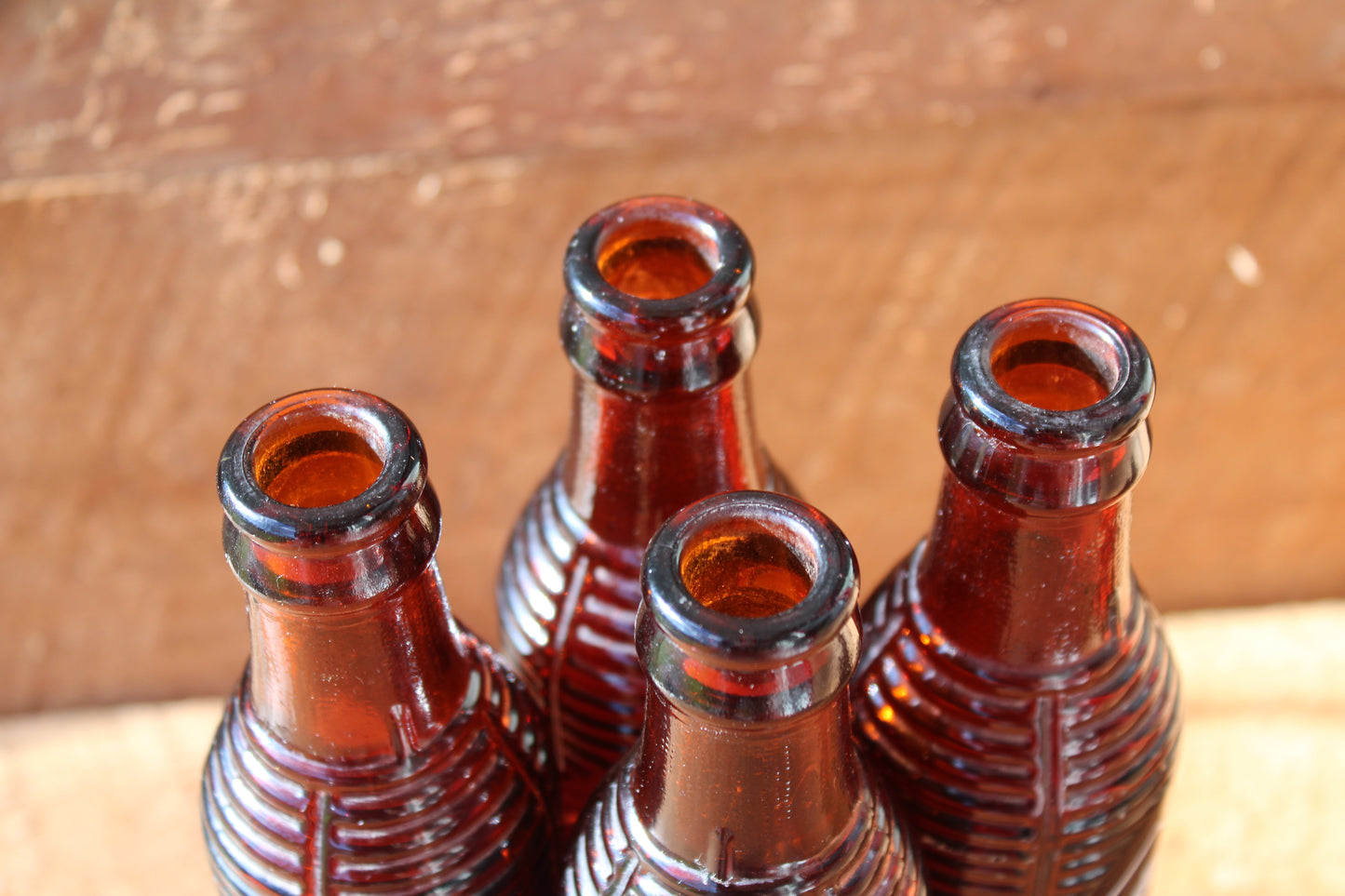 Circa 1940s Orange Crush ~ Crushy mascot ~ Lot of four ~ Brown Soda bottles