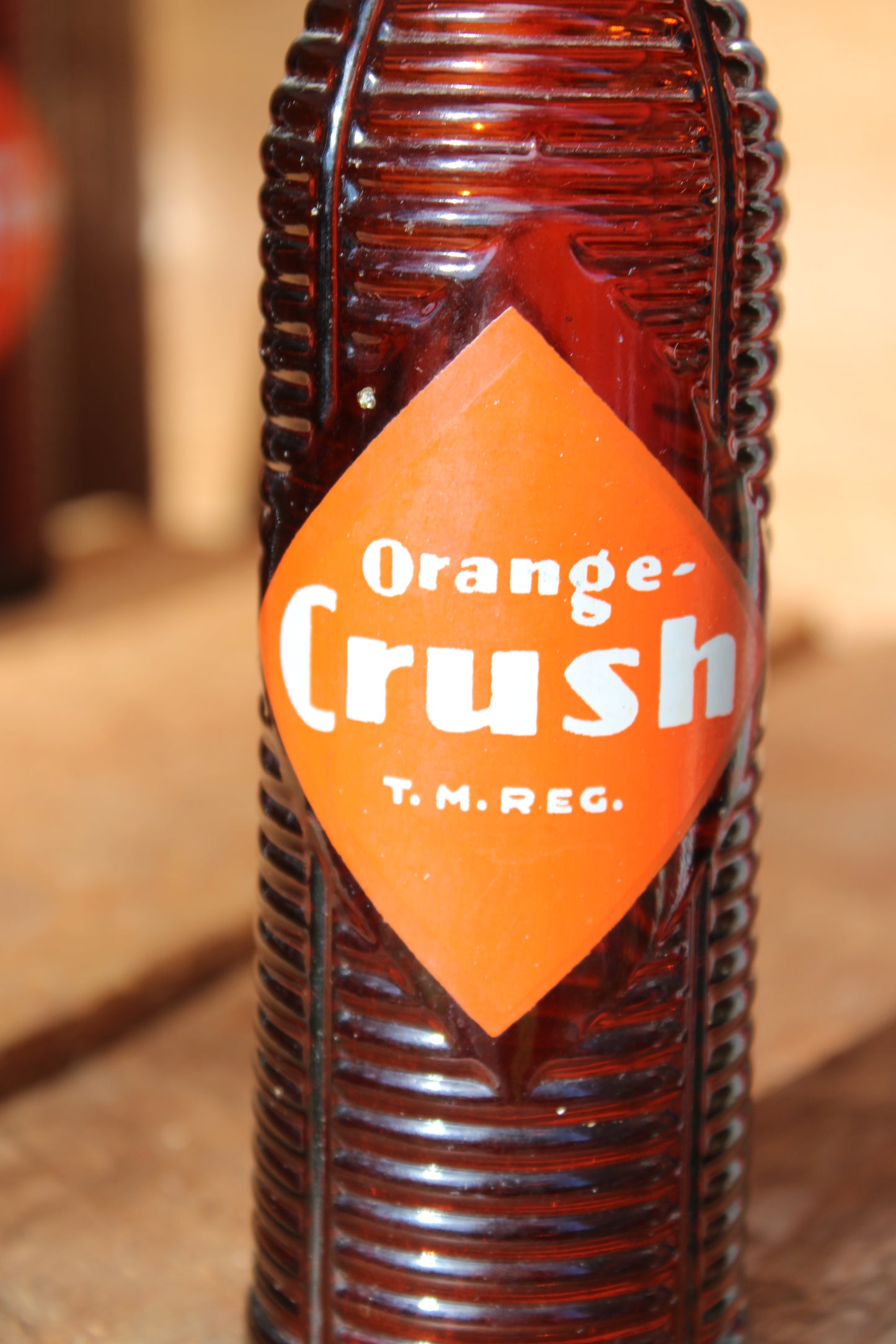 Circa 1940s Orange Crush ~ Crushy mascot ~ Lot of four ~ Brown Soda bottles