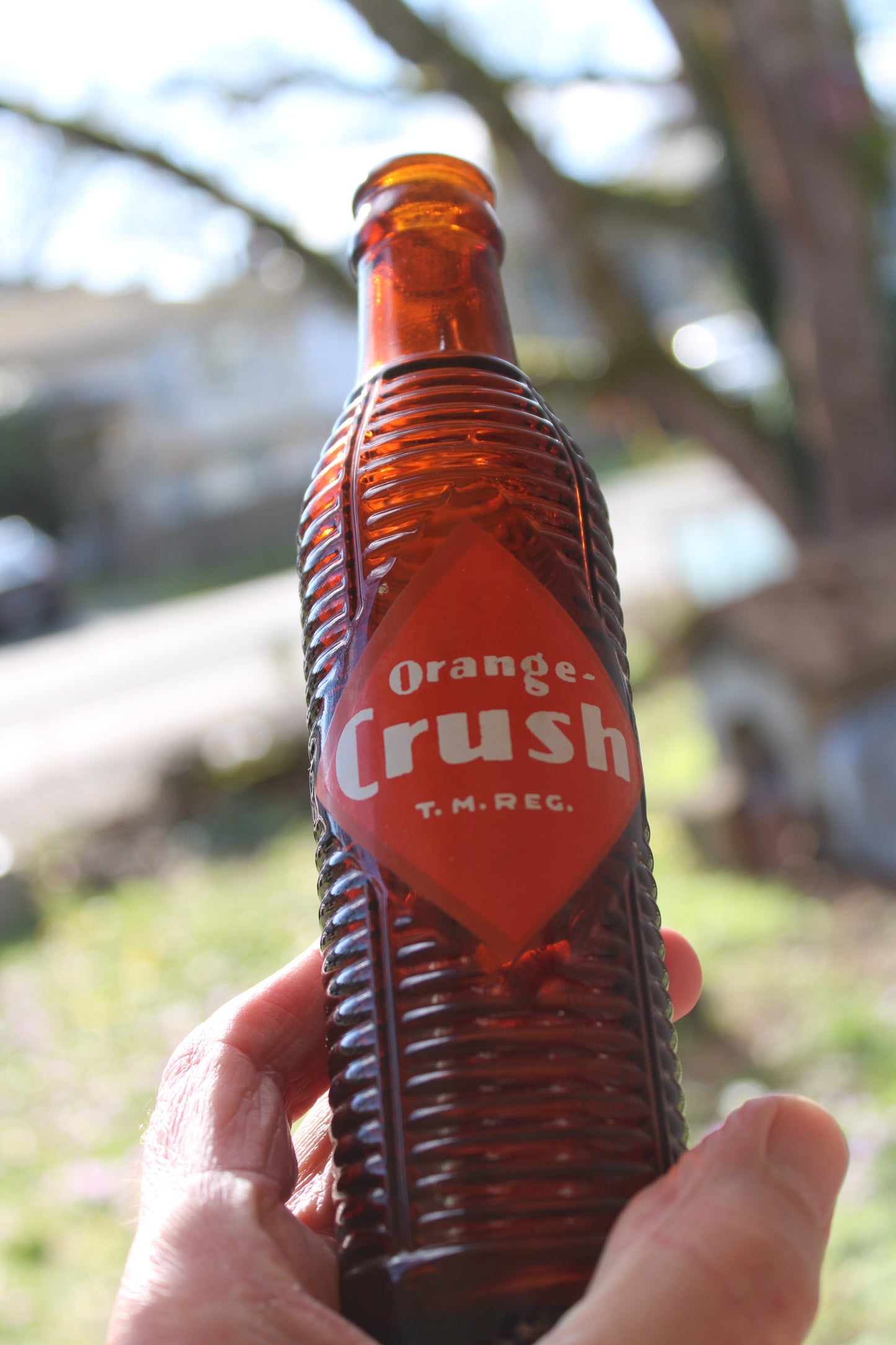 Circa 1940s Orange Crush ~ Crushy mascot ~ Lot of four ~ Brown Soda bottles