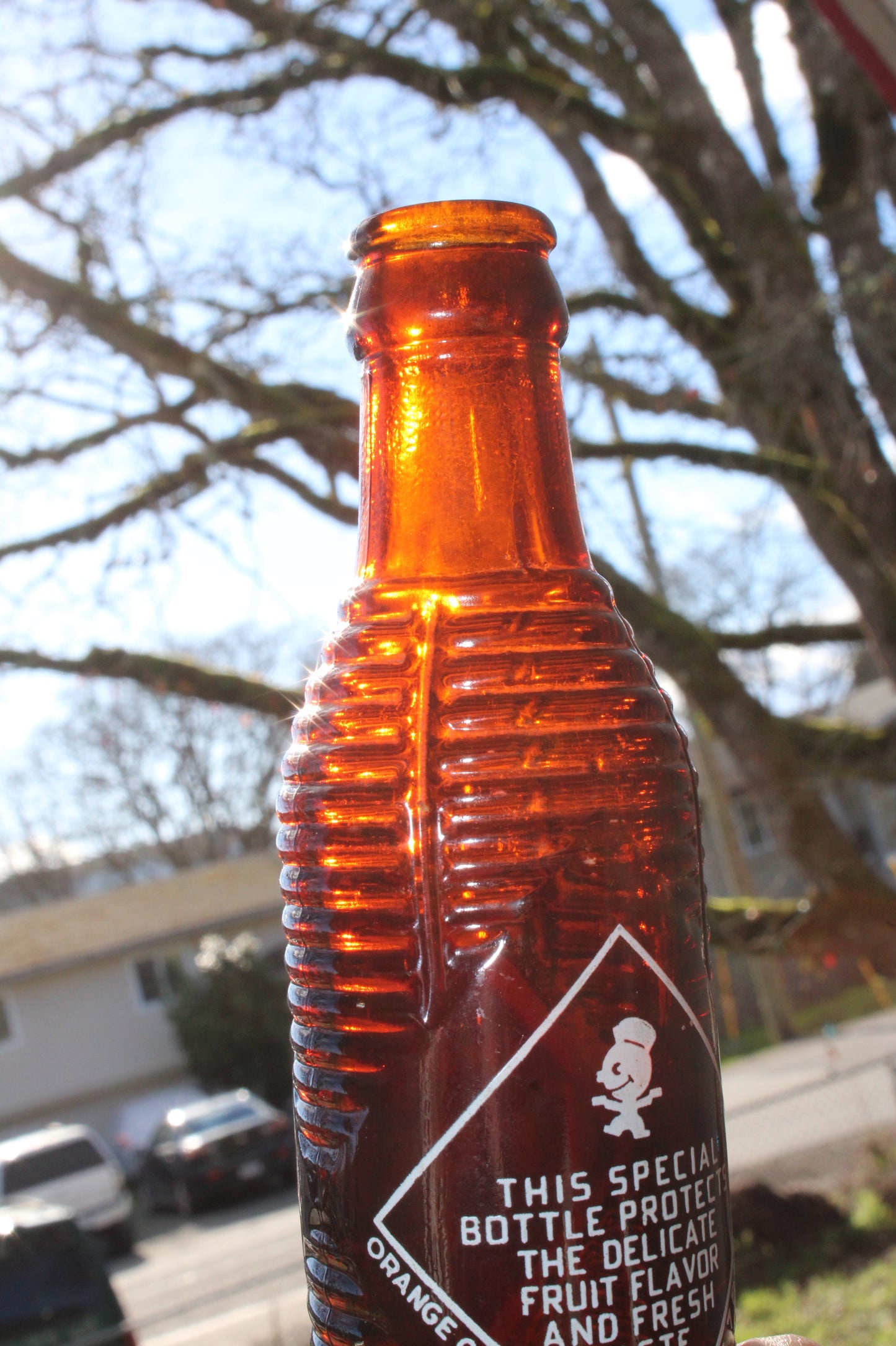 Circa 1940s Orange Crush ~ Crushy mascot ~ Lot of four ~ Brown Soda bottles